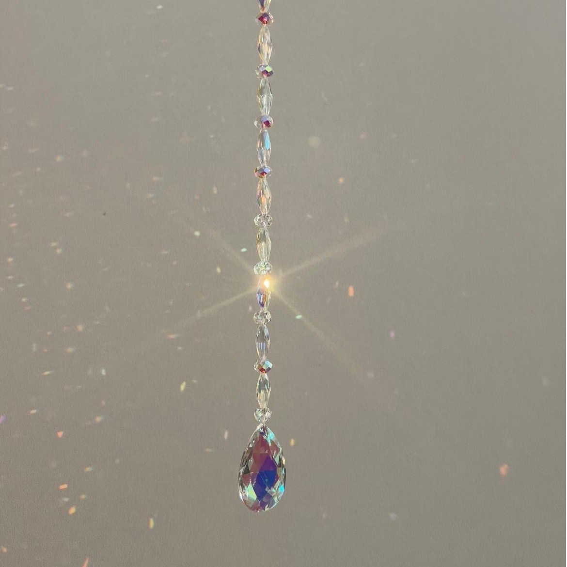 Kleine suncatcher, close-up met lichtspatten